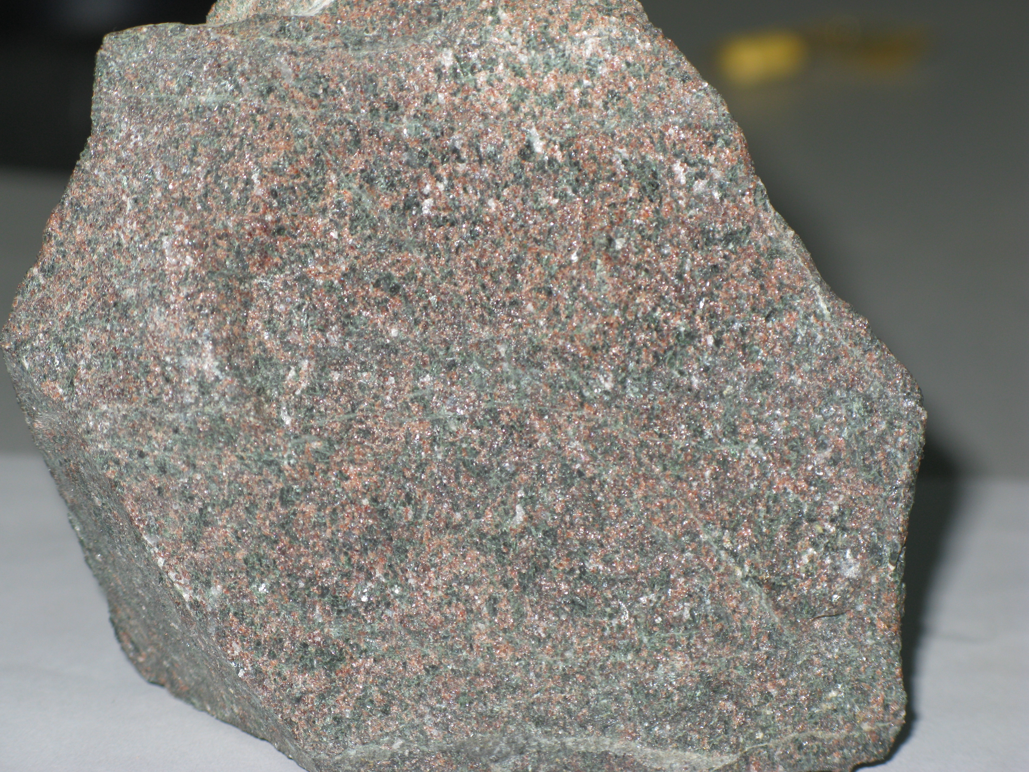 Magnesium isotopes found in this eclogite from the Davie Mountains of China provide information as to the temperature at which the rock formed millions of years ago. The grains are garnets and the green ones are omphacites.